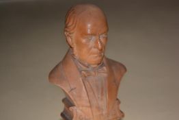 A 19th century carved boxwood bust of William Ewart Gladstone, named, inscribed with initials "JG"