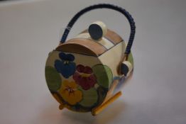 A Clarice Cliff for Newport Pottery Bizarre biscuit barrel, in the Delecia Pansies pattern and