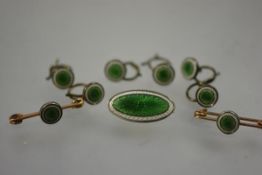 A lady's silver-backed enamel dress set, c. 1900, in engine-turned green and white enamel,