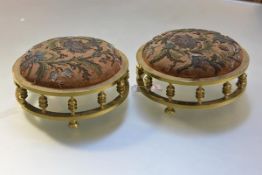 A pair of 19th century brass and beadwork footstools, each circular, with turned gallery, the seat