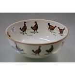 A Staffordshire bowl printed with cockfighting scenes, 19th century, probably Ashworth Brothers, the