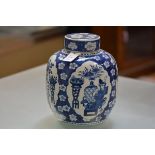 A large Chinese blue and white jar and cover, of baluster form, painted with cartouches of