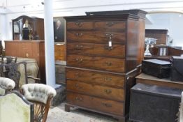 A George III mahogany chest on chest, c. 1800, the upper section with moulded cornice and