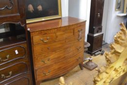 A 19th century inlaid mahogany bowfronted chest of drawers, the string inlaid croossbanded top above