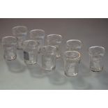 A set of nine Lalique glass liqueur or shot glasses in the Enfants pattern, etched mark "Lalique