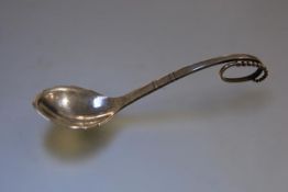 A Georg Jensen silver preserve spoon in the 41 pattern, French import marks. Length 12cm