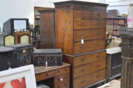 A George III mahogany chest on chest, the upper section with moulded cornice above two short and