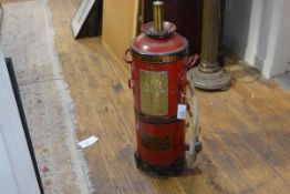 A late 19th century fire extinguisher, the brass plate inscribed "W.B. Dick's Extincteur....",