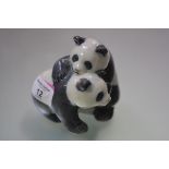 A Royal Copenhagen porcelain group of young pandas, model no. 667. Height 9cm