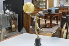 A gilt-metal figural table lamp, c. 1930, modelled as a dancing girl, her right arm upraised and