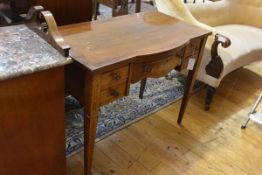 An Edwardian inlaid rosewood writing table, the crossbanded top above a central frieze drawer