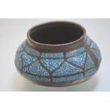 An Islamic copper and turquoise enamel bowl, late 19th century, of compressed globular form,