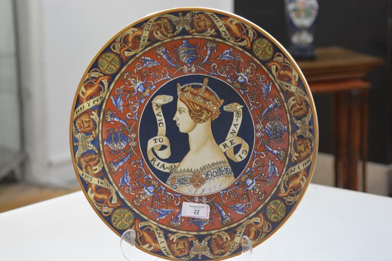 A striking Continental porcelain charger, late 19th century, moulded and painted in the