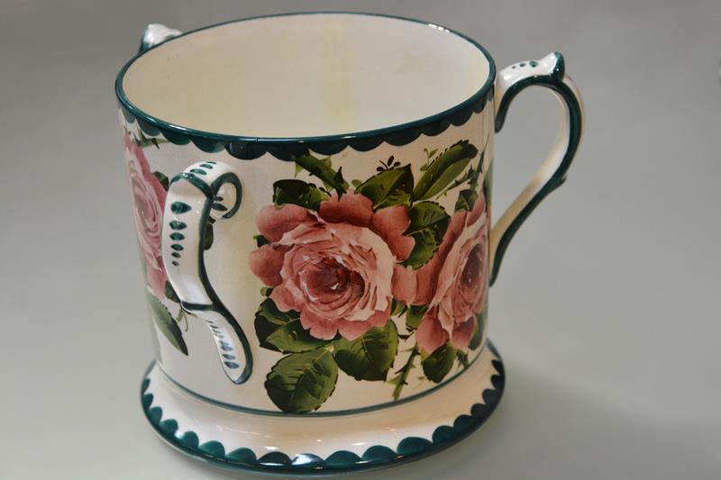 A large Wemyss Pottery tyg, c. 1900, decorated with cabbage roses within green dentilled bands,