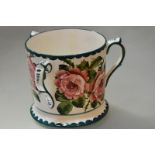 A large Wemyss Pottery tyg, c. 1900, decorated with cabbage roses within green dentilled bands,
