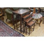 A set of Chinese carved hardwood quartetto tables, early 20th century, each with rectangular