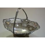 A George V silver swing-handled cake basket, Mappin & Webb, Sheffield 1916, of oval form, the