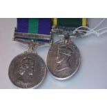G.S.M. Pair, G.S.M. clasp Malaya (22518182 Brd. J. Carson, R.A.; Territorial Efficiency Medal (
