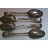 A group of four George II Provincial and London silver table spoons: one Exeter 1731; another