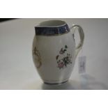 A Chinese Export porcelain cider or ale jug, c. 1800, of barrel form, with crossed strap handle,