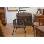 A 19th century primitive Windsor armchair, possibly West Country or Welsh, the comb crest rail above