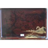 A Japanese lacquer tray, rectangular, the red lacquer decorated with a blossoming tree and