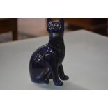 A Griselda Hill for Wemyss Pottery model of a seated cat, glazed in blue, with glass eyes, painted