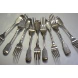 A composed set of nine 19th century Scottish Provincial silver table forks, five William Jamieson,