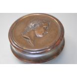 A Continental pressed burr wood snuff box, the cover inset with a patinated metal plaque with a