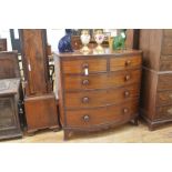 A handsome early Victorian bowfronted mahogany chest of drawers, the string inlaid crossbanded top