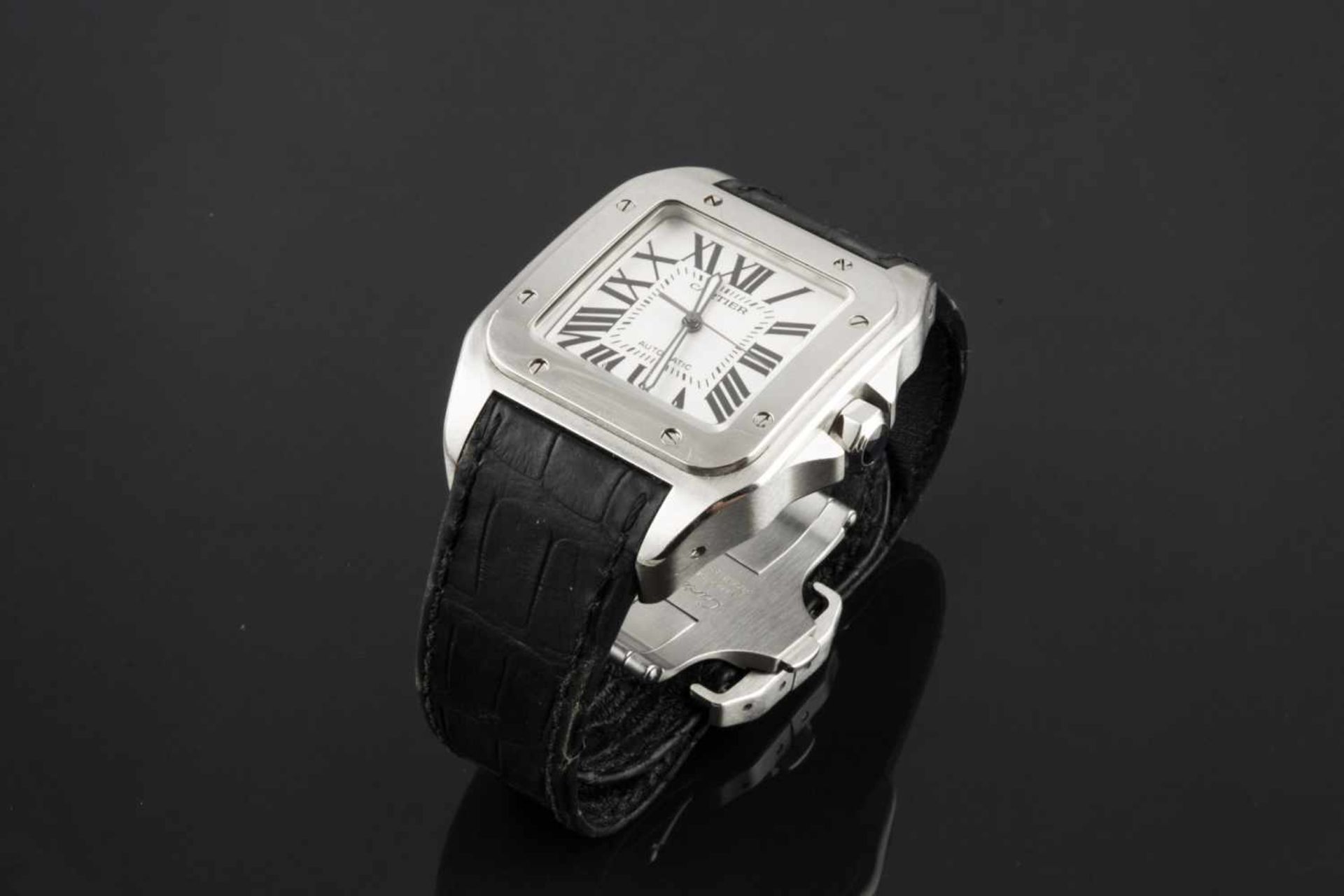 RELOJ CARTIER SANTOS 100 Realizado en acero para caballero. Caja cuadrada, bisel atornillado.