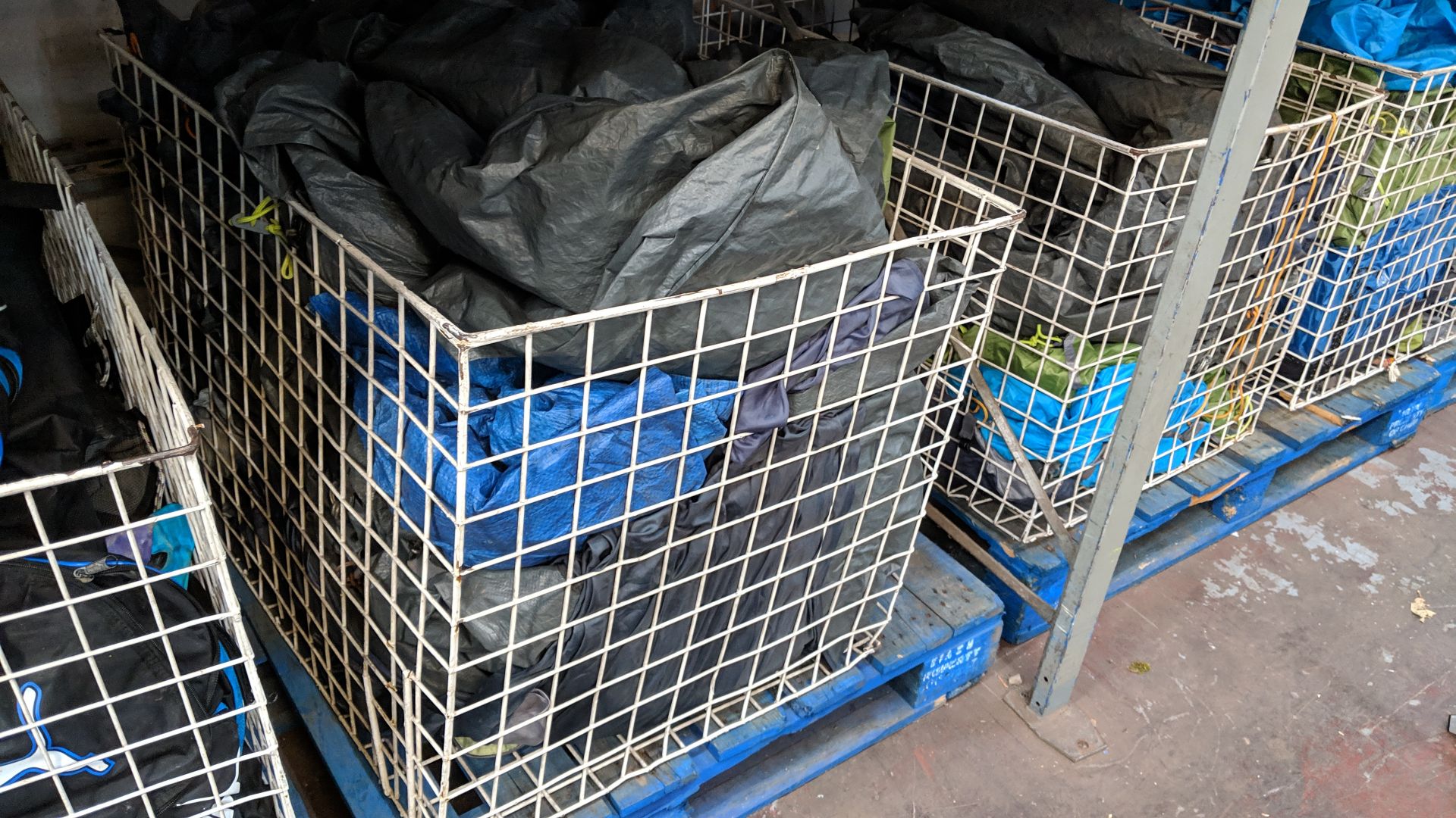Contents of 5 large cages of assorted groundsheets, tarps & other camping related items - cages - Image 12 of 17