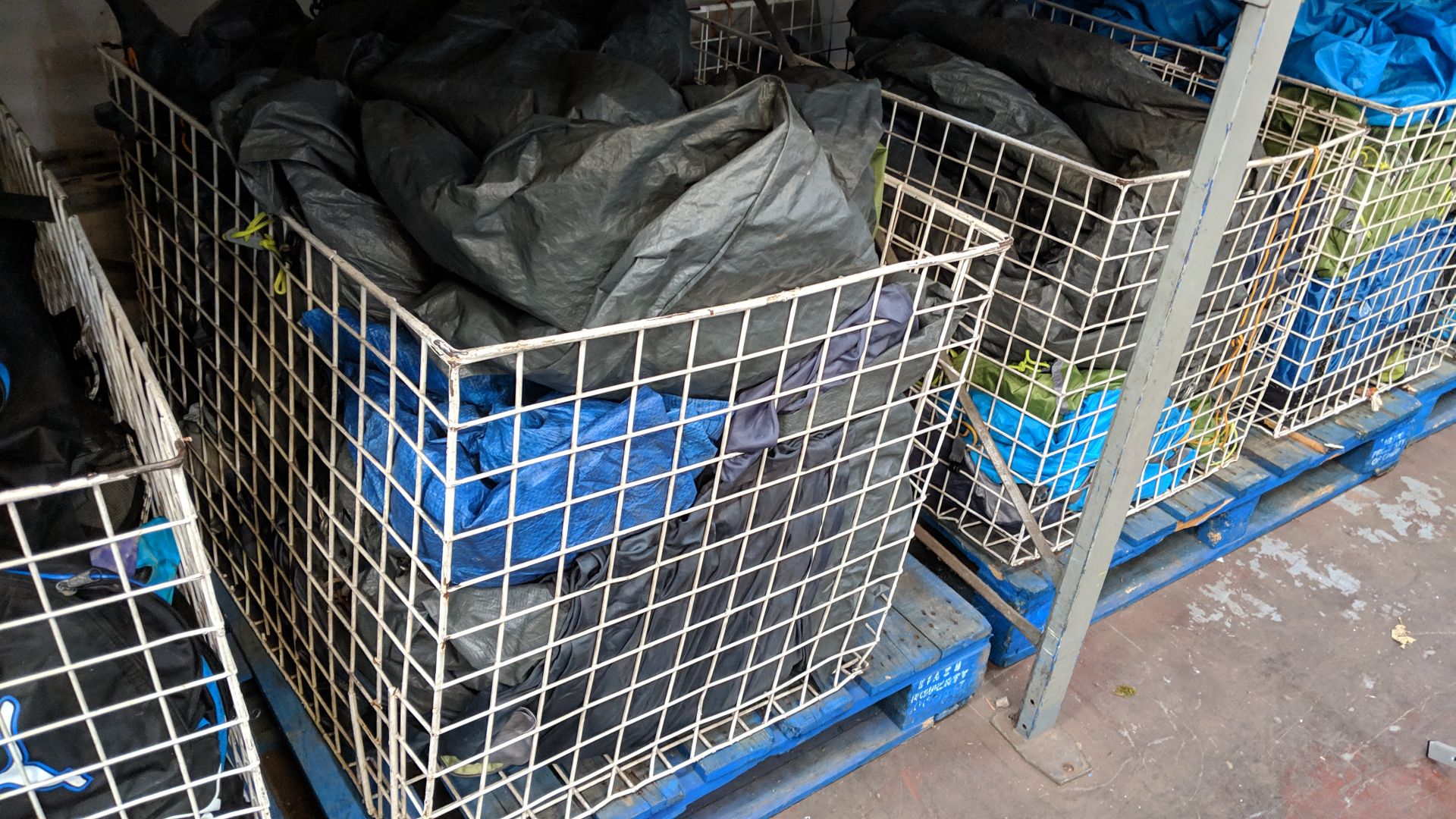 Contents of 5 large cages of assorted groundsheets, tarps & other camping related items - cages - Image 13 of 17