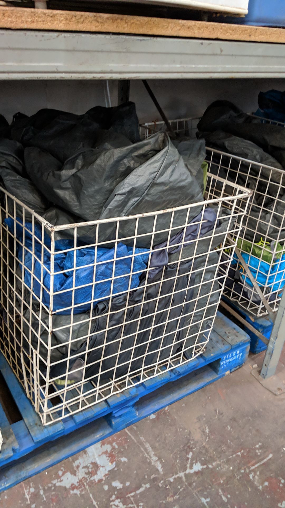 Contents of 5 large cages of assorted groundsheets, tarps & other camping related items - cages - Image 14 of 17