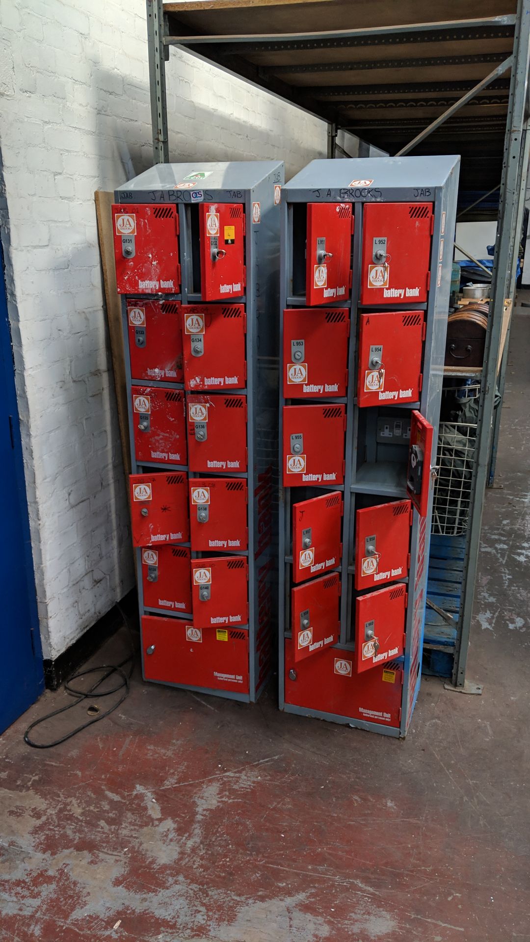 2 off battery bank lockable cubicles, each comprising a total of 12 small lockable cubicles with