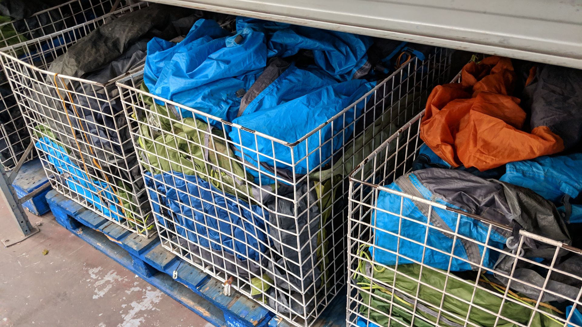 Contents of 5 large cages of assorted groundsheets, tarps & other camping related items - cages - Image 9 of 17