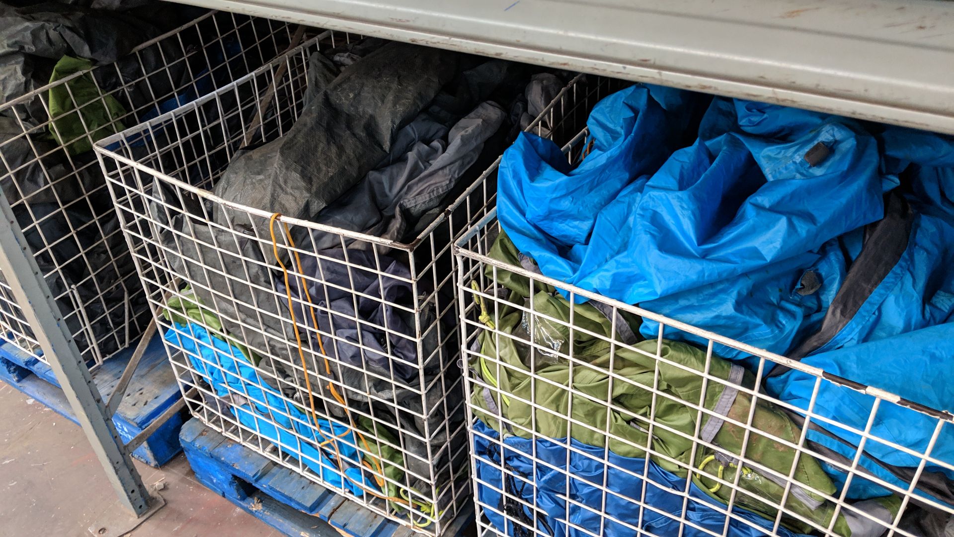 Contents of 5 large cages of assorted groundsheets, tarps & other camping related items - cages - Image 11 of 17