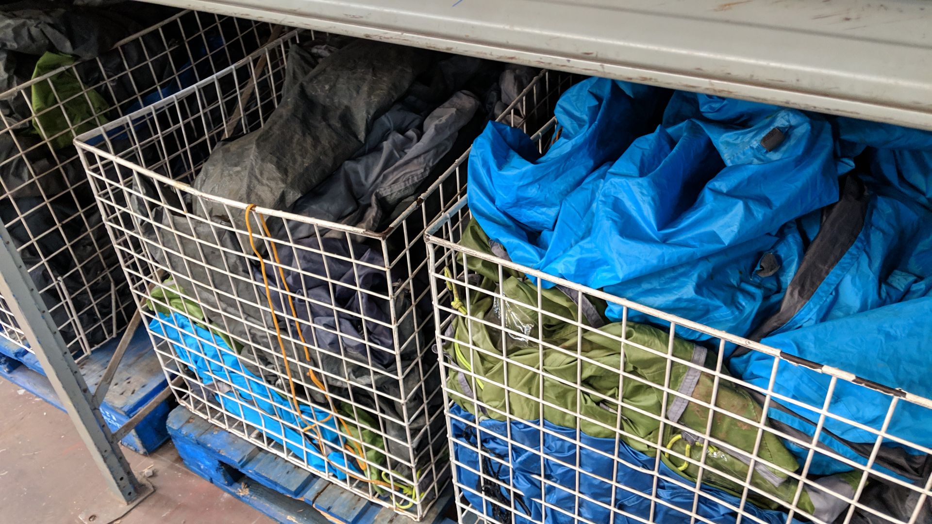 Contents of 5 large cages of assorted groundsheets, tarps & other camping related items - cages - Image 10 of 17