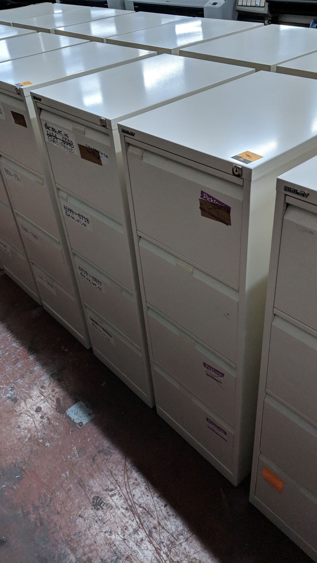 4 off Bisley off-white metal 4 drawer filing cabinets IMPORTANT: Please remember goods