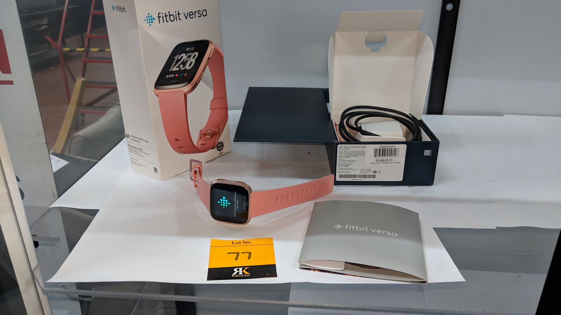 Fitbit Versa Health & Fitness Smartwatch plus assorted accessories, box, etc. This lot is exempt