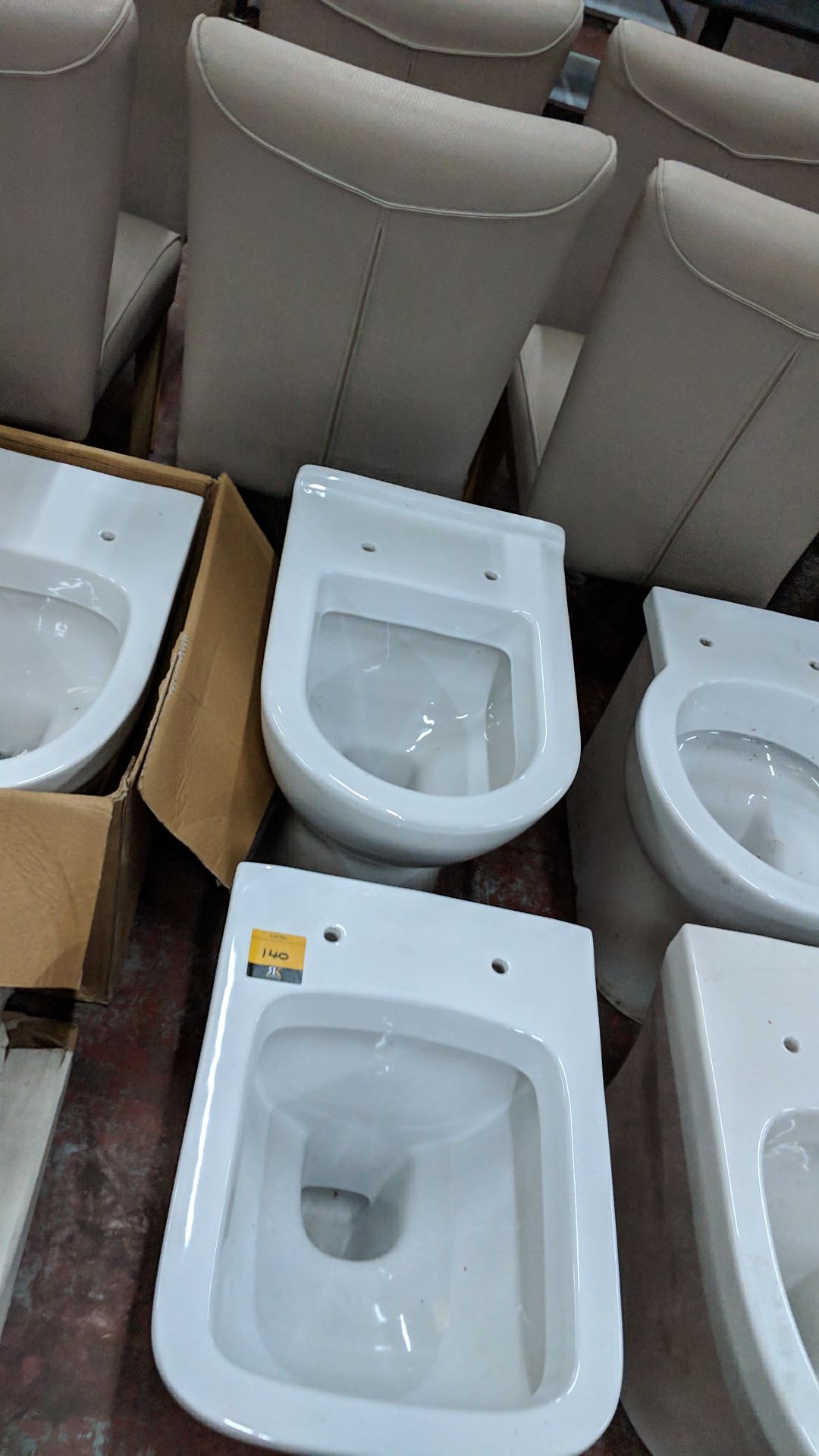 4 off assorted back-to-wall WC pans Lots 100 - 142 & 146 - 167 are being sold on behalf of a - Image 4 of 7