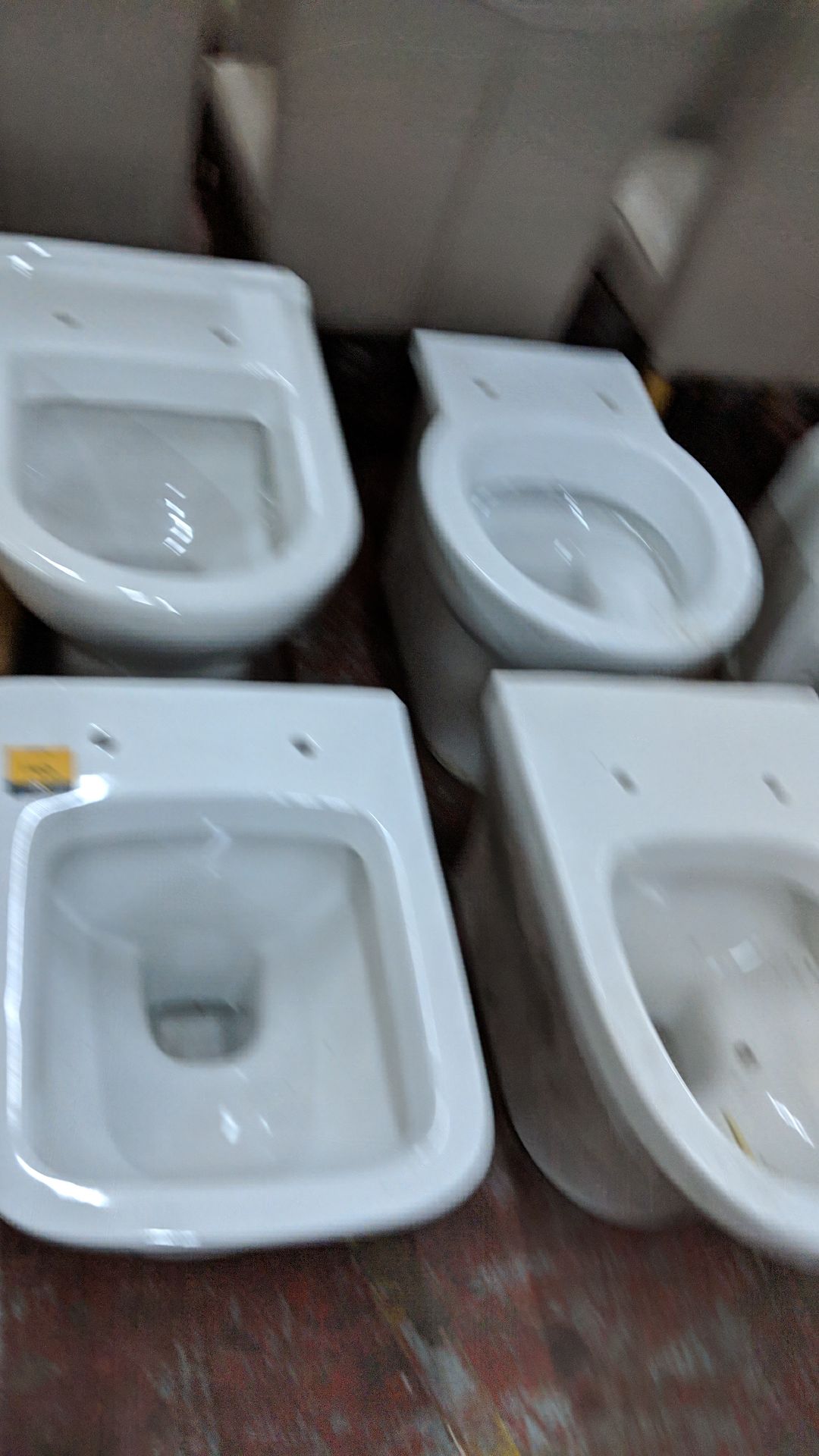 4 off assorted back-to-wall WC pans Lots 100 - 142 & 146 - 167 are being sold on behalf of a - Image 5 of 7