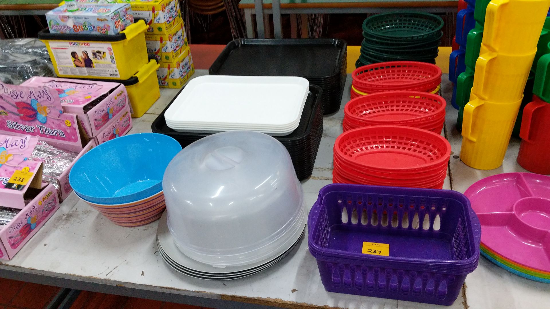 Double row of plastic trays, baskets & cloches Lots 80 - 95 & 168 - 249 consist of café furniture,