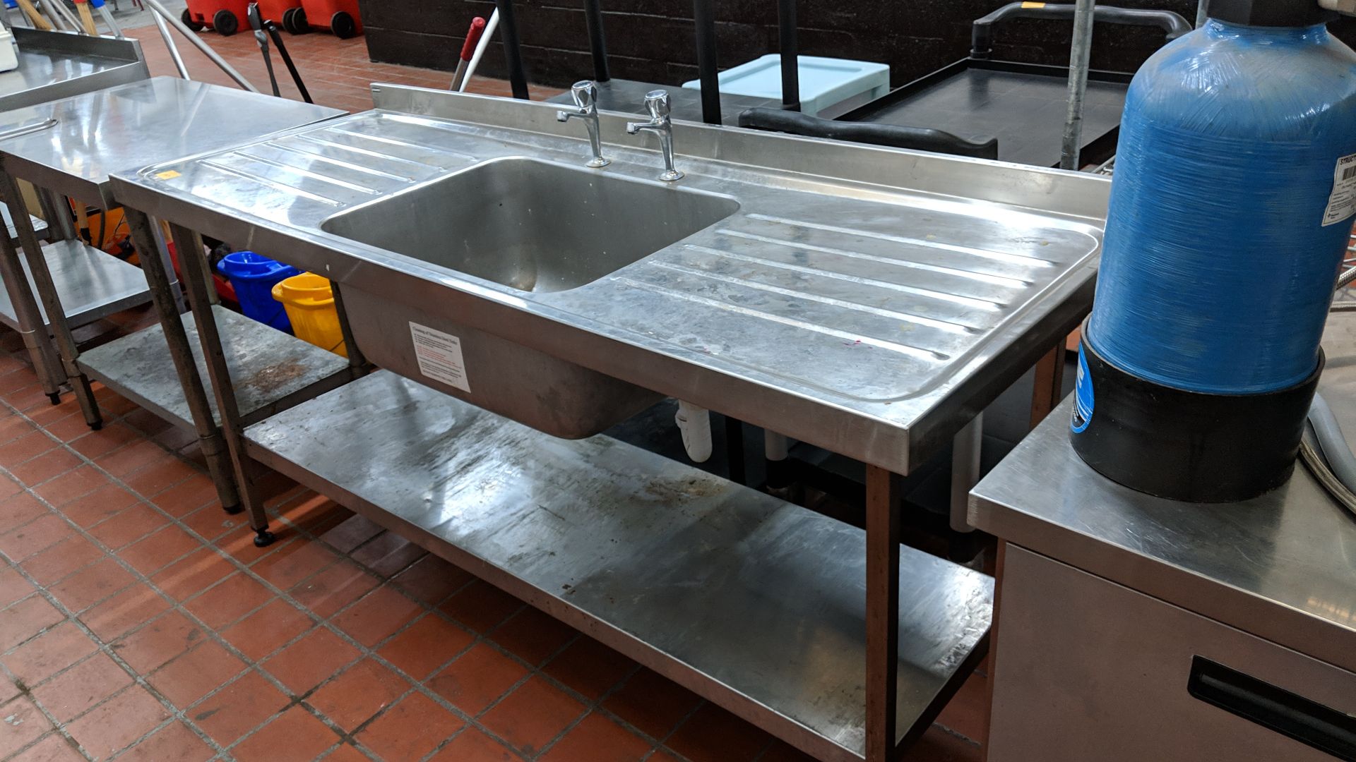 Stainless steel twin-tier table/sink arrangement with drainers on either side circa 1800mm long Lots