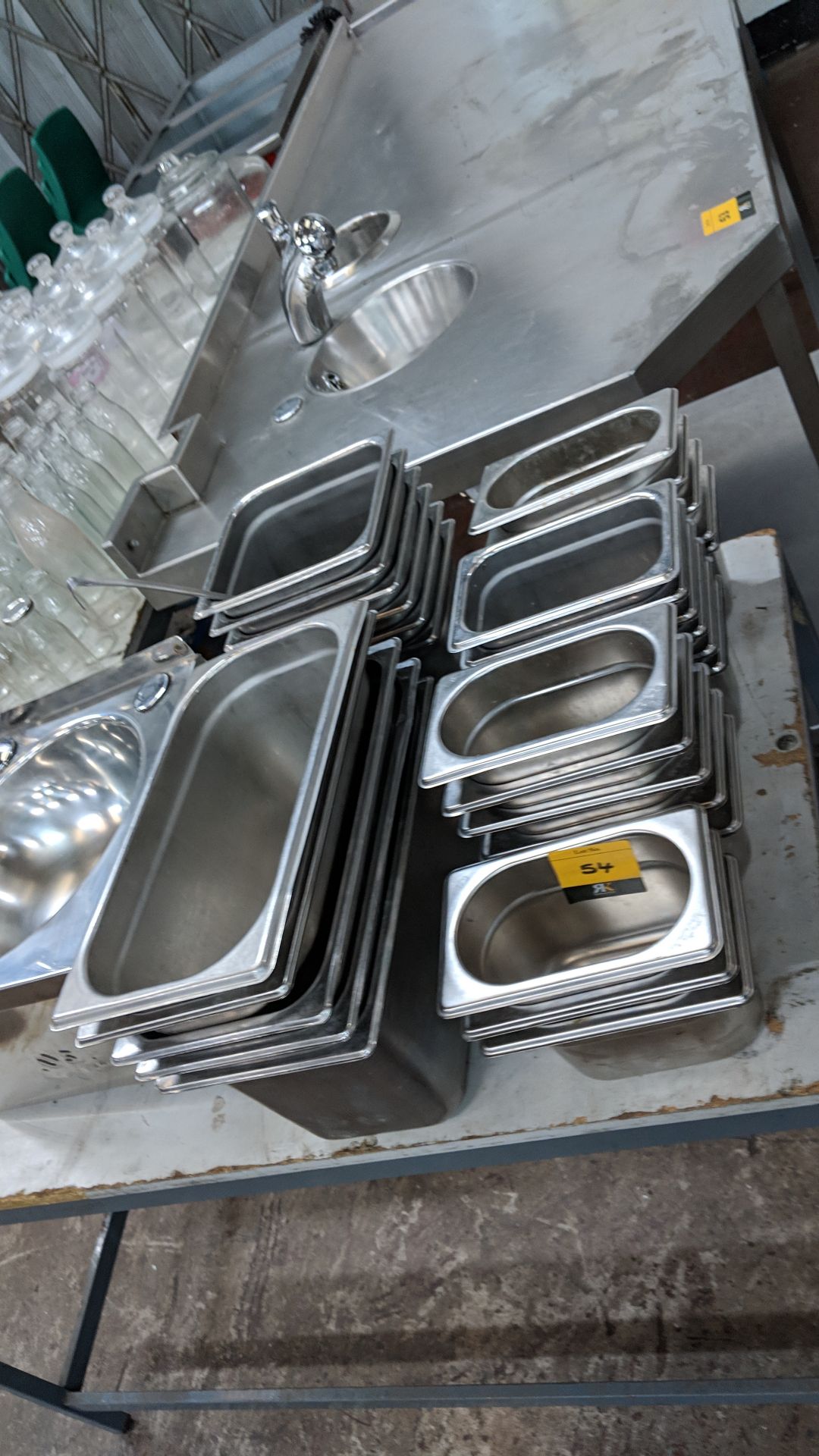 Quantity of assorted stainless steel dishes IMPORTANT: Please remember goods successfully bid upon