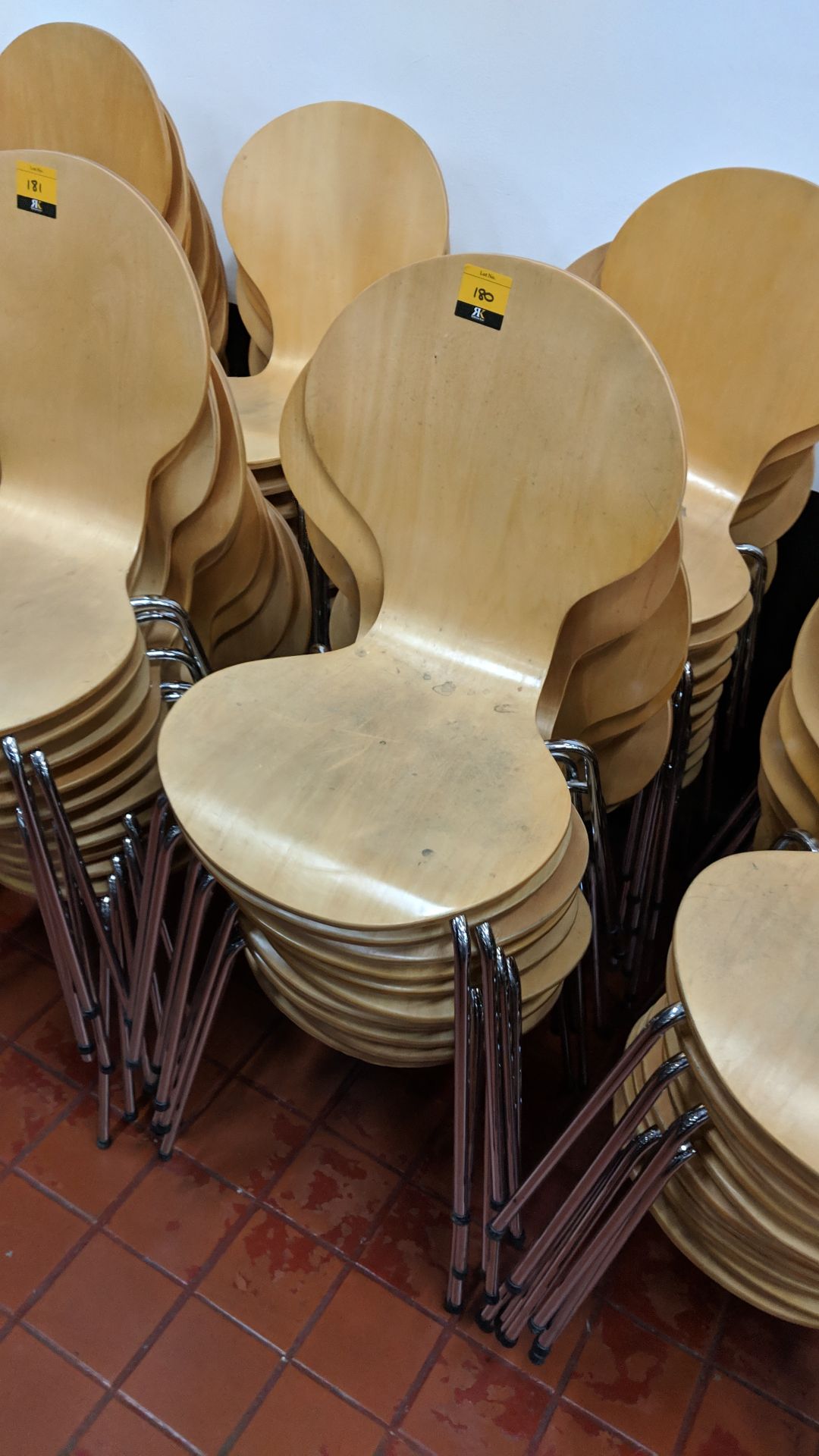 20 off stacking wooden chairs on chrome metal bases NB. Lots 179 - 184 consist of different