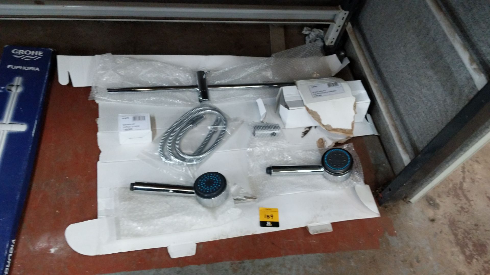 Slider rail kit with pair of shower heads Lots 100 - 142 & 146 - 167 are being sold on behalf of a