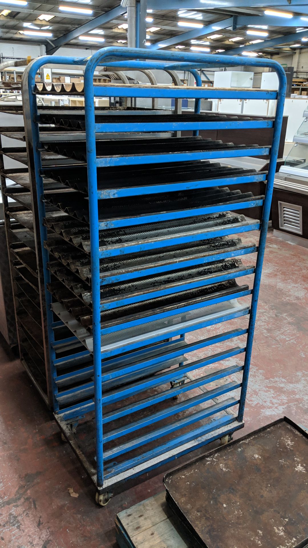 Blue 15 tier baker's trolley including 10 curved trays for use with sameLots 187 – 189 and 198 - 239