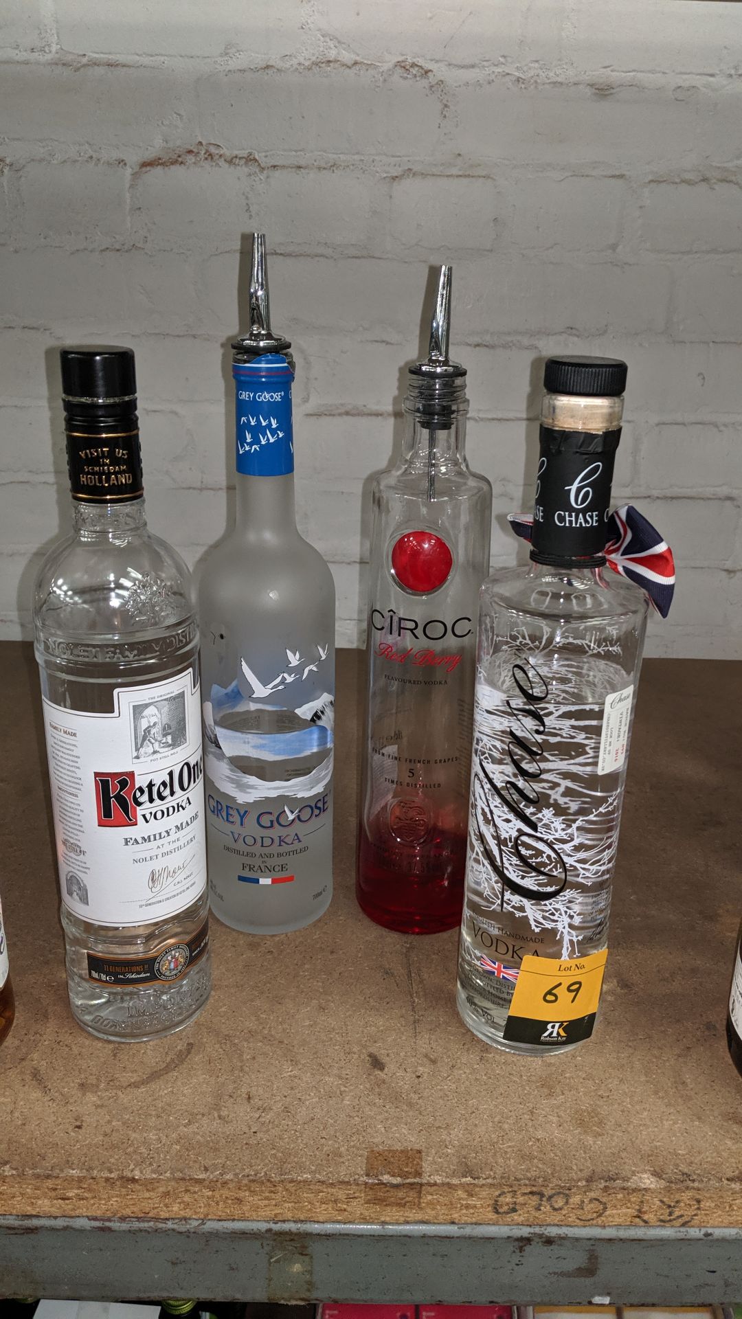 4 assorted opened bottles of vodka by Grey Goose, Chase & others sold under AWRS number