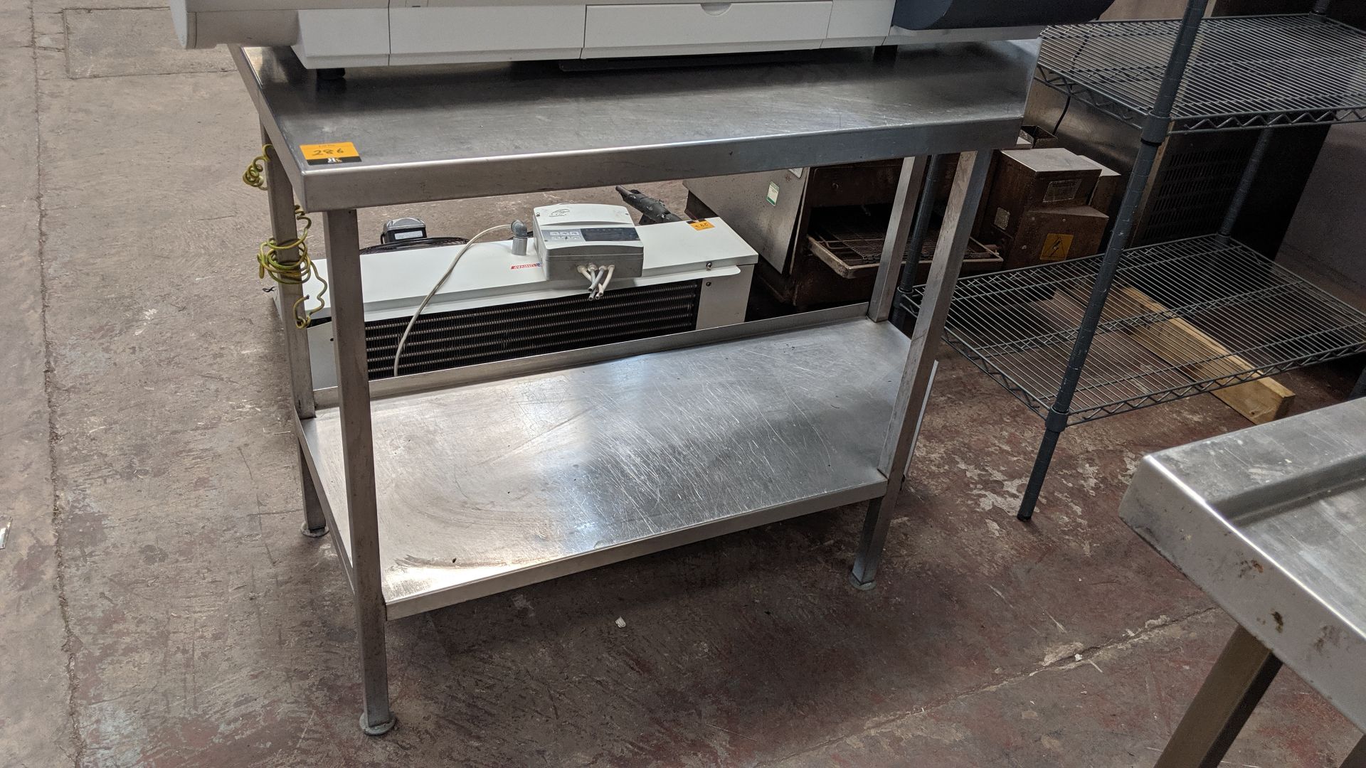 Stainless steel twin tier table IMPORTANT: Please remember goods successfully bid upon must be - Image 2 of 2